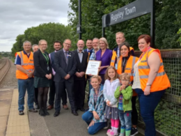 Retail giant adopts two London Midland rail stations