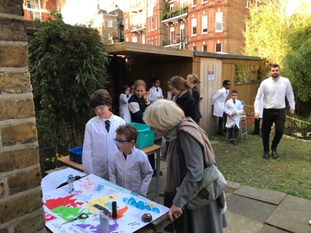 Lady Ogden having phyics explained by pupils of Avonmore Primary School