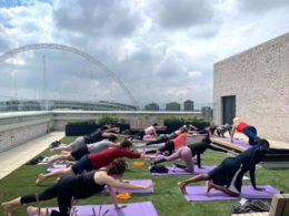 Tipi residents enjoy rooftop wellness sessions against backdrop of Wembley Stadium