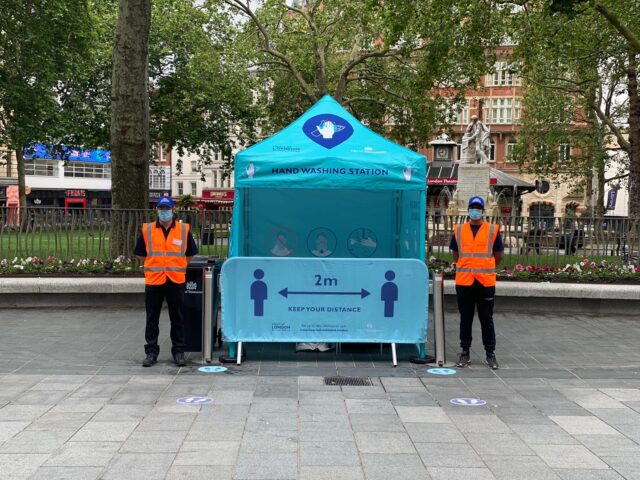 1. Social Distancing Ambassadors at HOLBA Hand Sanitisig Station in Leicester Square