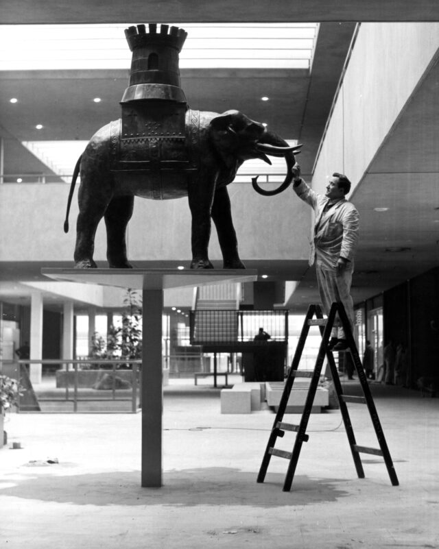View of the new Elephant and Castle as it takes shape after the redevelopment work. Showing the final touches being made to the original statue which stood on the public house which has now been given place of honour in the new shopping centre.23 March 1965 - London, England