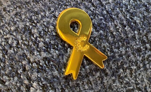 Cancer Research UK for Children & Young People gold ribbon 2