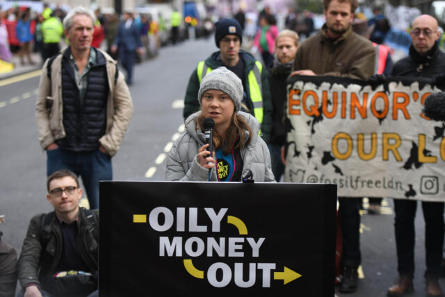 'Oily Money Out' - Activists outside Major Oil Conference in London