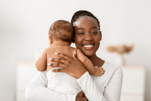 happy-black-woman-baby