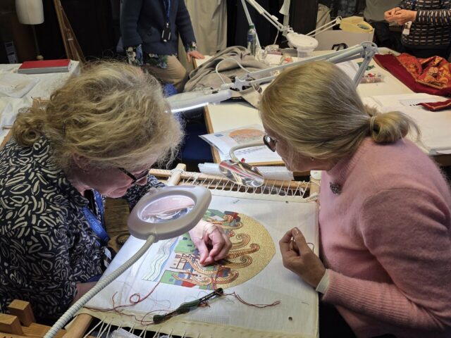 Image 2 - Volunteer stitchers working on the St Pauls Cathedral panel for the Circle of Life